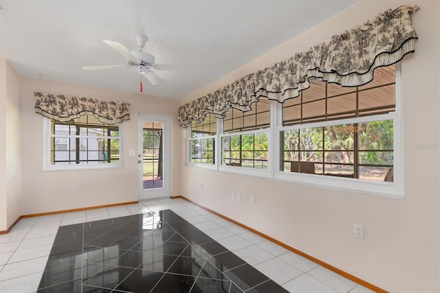 485 Dorchester St, Port Charlotte, FL 33954 - unfurnished room with baseboards, ceiling fan, and tile patterned flooring