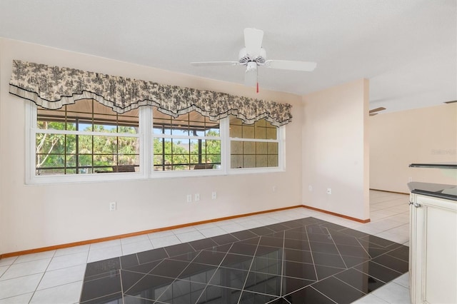 485 Dorchester St, Port Charlotte, FL 33954 - unfurnished dining area featuring tile patterned flooring, ceiling fan, and baseboards