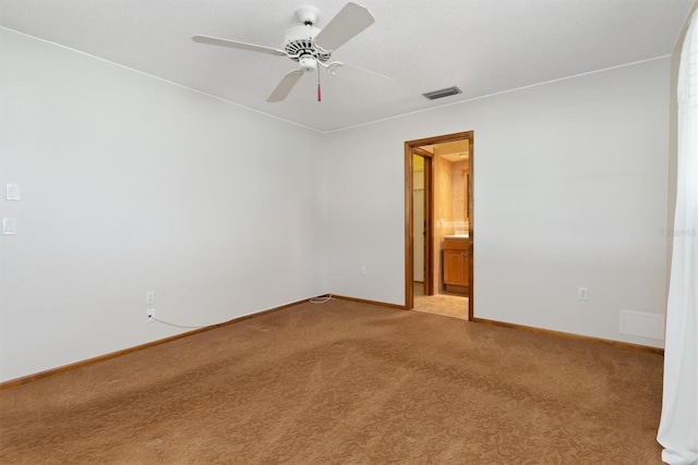 485 Dorchester St, Port Charlotte, FL 33954 - carpeted empty room featuring baseboards and a ceiling fan