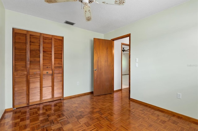 485 Dorchester St, Port Charlotte, FL 33954 - unfurnished bedroom with baseboards, a closet, and a ceiling fan