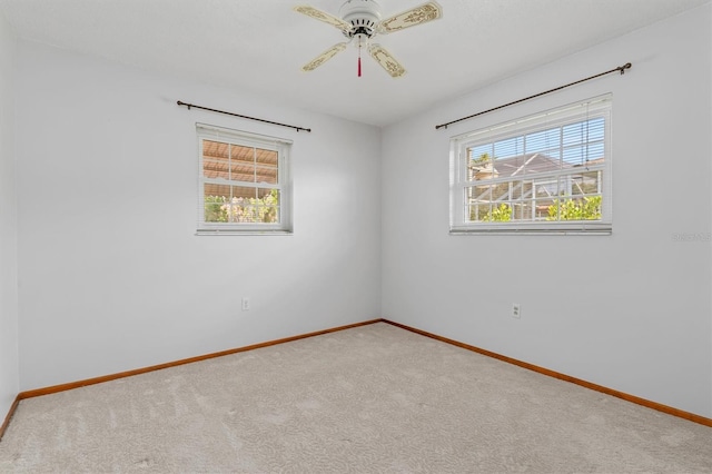 485 Dorchester St, Port Charlotte, FL 33954 - carpeted empty room featuring baseboards and ceiling fan