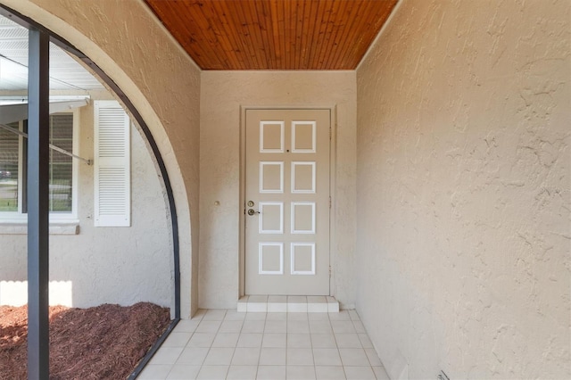 485 Dorchester St, Port Charlotte, FL 33954 - doorway to property featuring stucco siding