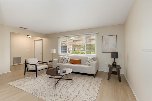 485 Dorchester St, Port Charlotte, FL 33954 - living area with light wood finished floors and baseboards