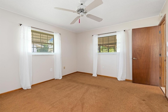 485 Dorchester St, Port Charlotte, FL 33954 - unfurnished bedroom with light carpet and a ceiling fan