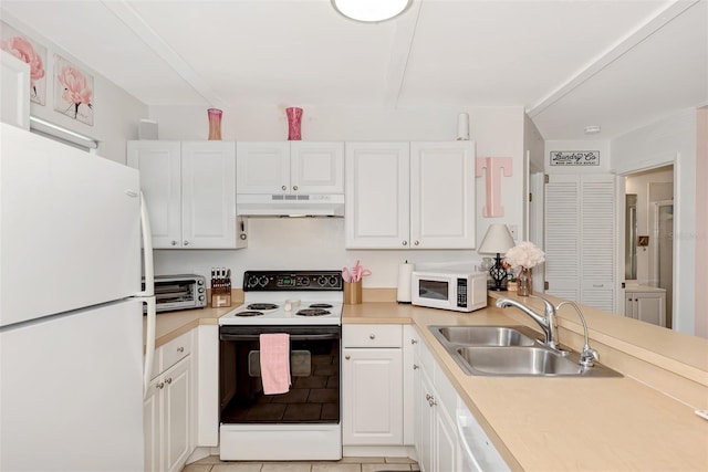 25100 Sandhill Blvd Unit F-203, Punta Gorda, FL 33983 - kitchen featuring white appliances, under cabinet range hood, a sink, and light countertops