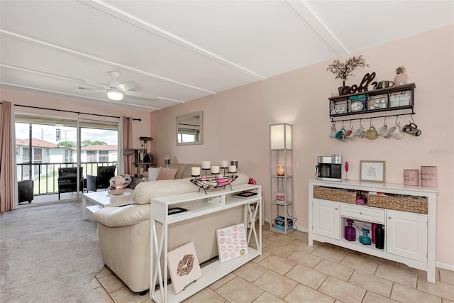 25100 Sandhill Blvd Unit F-203, Punta Gorda, FL 33983 - living area featuring a ceiling fan, light tile patterned floors, and beam ceiling