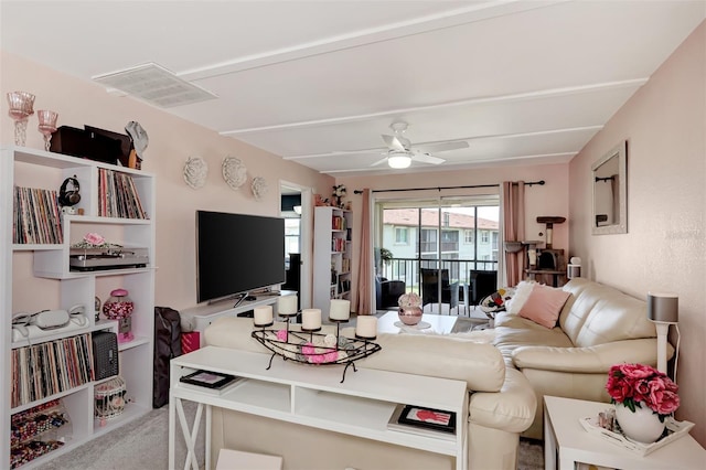 25100 Sandhill Blvd Unit F-203, Punta Gorda, FL 33983 - living area with ceiling fan and carpet floors
