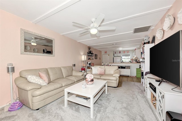 25100 Sandhill Blvd Unit F-203, Punta Gorda, FL 33983 - tiled living area with a ceiling fan and carpet