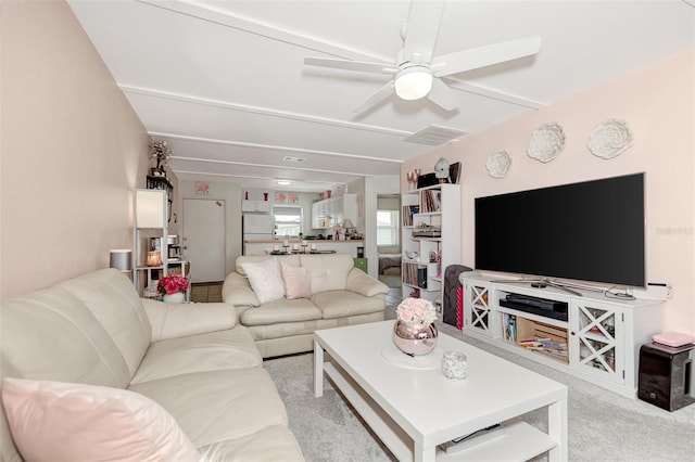 25100 Sandhill Blvd Unit F-203, Punta Gorda, FL 33983 - living room with a ceiling fan and light colored carpet