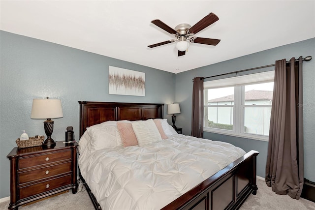 25100 Sandhill Blvd Unit F-203, Punta Gorda, FL 33983 - bedroom with light carpet, baseboards, and ceiling fan