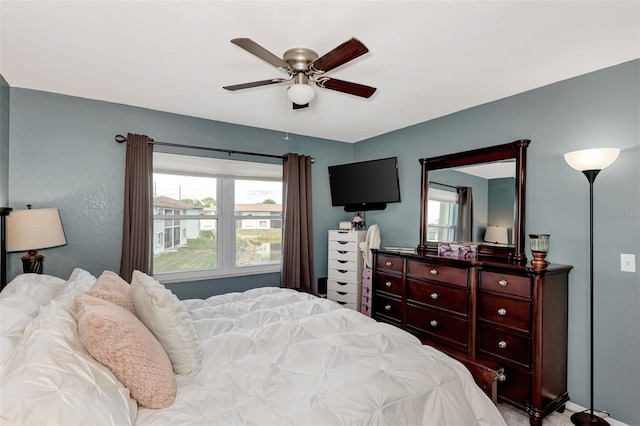 25100 Sandhill Blvd Unit F-203, Punta Gorda, FL 33983 - bedroom with multiple windows and ceiling fan