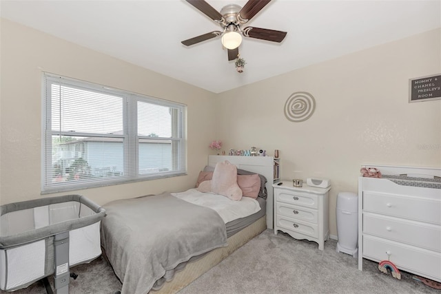 25100 Sandhill Blvd Unit F-203, Punta Gorda, FL 33983 - bedroom with multiple windows, light carpet, and a ceiling fan