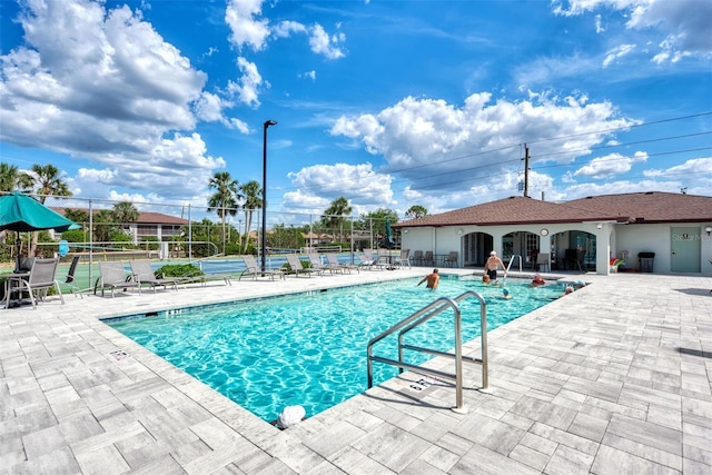 25100 Sandhill Blvd Unit F-203, Punta Gorda, FL 33983 - community pool featuring fence and a patio