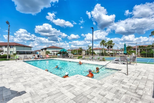 25100 Sandhill Blvd Unit F-203, Punta Gorda, FL 33983 - community pool featuring fence and a patio area