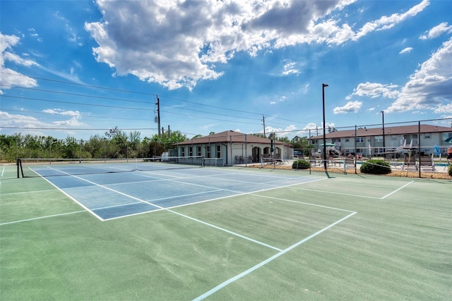 25100 Sandhill Blvd Unit F-203, Punta Gorda, FL 33983 - view of tennis court featuring fence