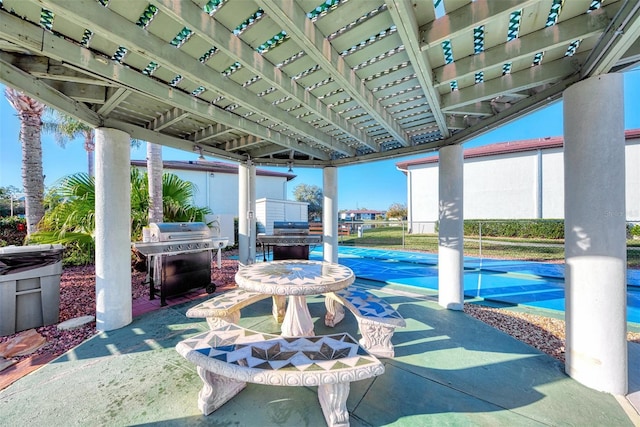 25100 Sandhill Blvd Unit F-203, Punta Gorda, FL 33983 - view of patio with grilling area and a pergola