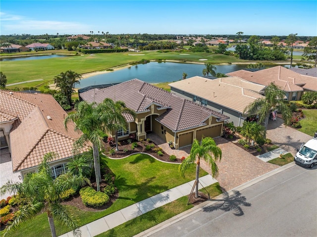5461 White Ibis Dr, North Port, FL 34287 - aerial view of residential area featuring a nearby body of water and a local golf course