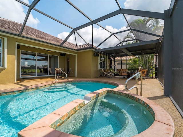 5461 White Ibis Dr, North Port, FL 34287 - view of swimming pool with a patio, a pool with connected hot tub, and a ceiling fan