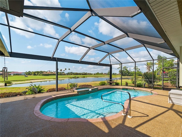 5461 White Ibis Dr, North Port, FL 34287 - view of pool with a water view, a patio area, a pool with connected hot tub, and glass enclosure
