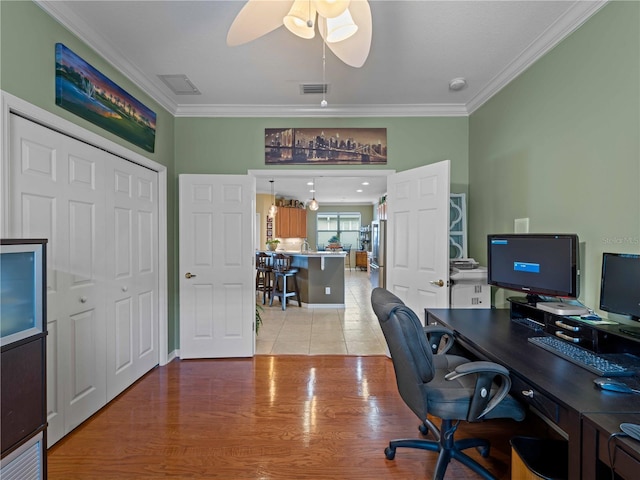 5461 White Ibis Dr, North Port, FL 34287 - office space featuring crown molding, ceiling fan, wood finished floors, and baseboards