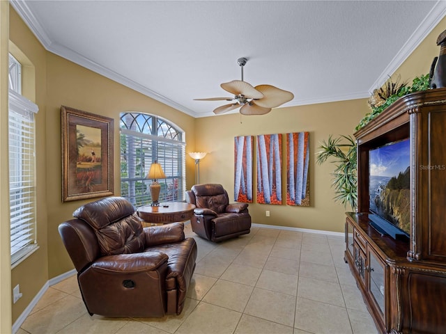 5461 White Ibis Dr, North Port, FL 34287 - living room with ceiling fan, ornamental molding, baseboards, and light tile patterned floors