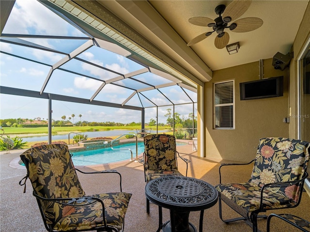 5461 White Ibis Dr, North Port, FL 34287 - view of patio / terrace featuring a hot tub, an outdoor pool, ceiling fan, a water view, and a lanai