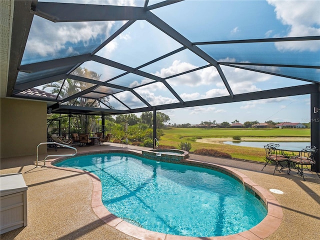 5461 White Ibis Dr, North Port, FL 34287 - view of swimming pool with a patio, a water view, a pool with connected hot tub, and glass enclosure