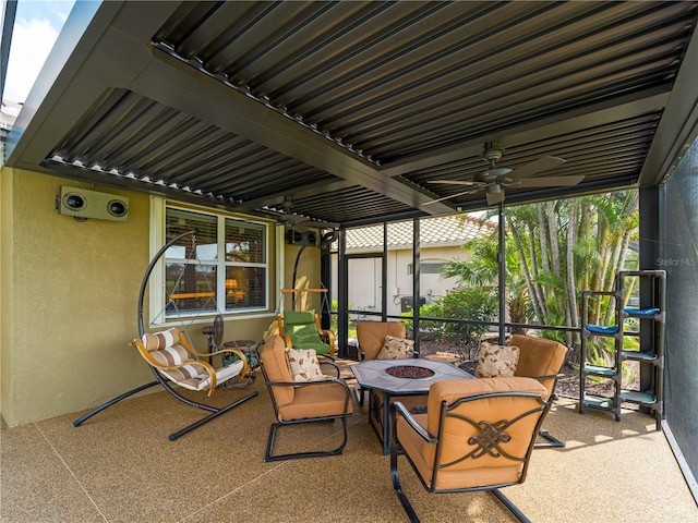 5461 White Ibis Dr, North Port, FL 34287 - sunroom / solarium featuring an outdoor fire pit and ceiling fan