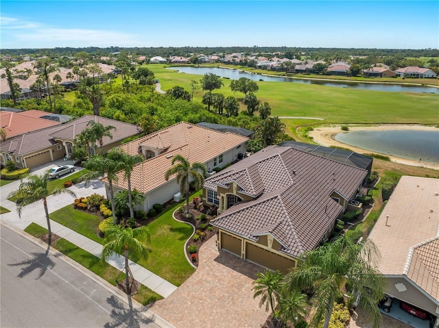 5461 White Ibis Dr, North Port, FL 34287 - aerial perspective of suburban area with a large body of water and a golf club