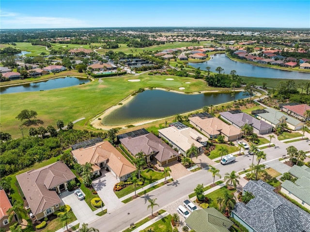 5461 White Ibis Dr, North Port, FL 34287 - aerial view of property's location featuring nearby suburban area, a golf club, and a nearby body of water