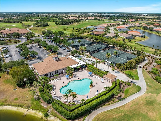 5461 White Ibis Dr, North Port, FL 34287 - aerial view of property's location featuring a golf course, a nearby body of water, and a pool