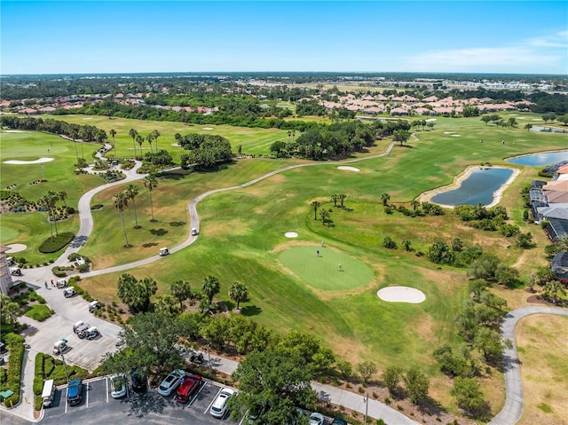 5461 White Ibis Dr, North Port, FL 34287 - aerial view of property's location with a nearby body of water, a golf club, and nearby suburban area