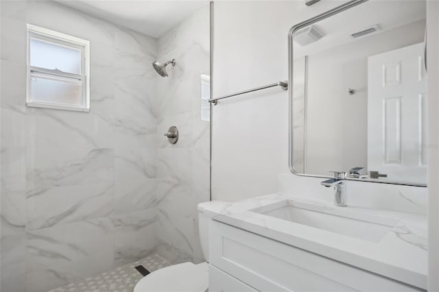 10517 Greenway Ave, Englewood, FL 34224 - full bath with a tile shower, toilet, and vanity
