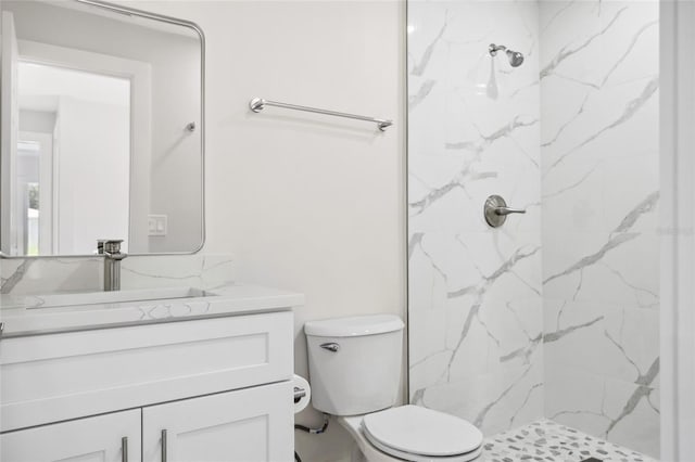 10517 Greenway Ave, Englewood, FL 34224 - full bathroom with vanity, a marble finish shower, and toilet