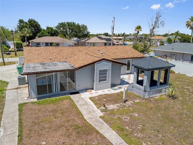10517 Greenway Ave, Englewood, FL 34224 - rear view of property with a gazebo and a residential view