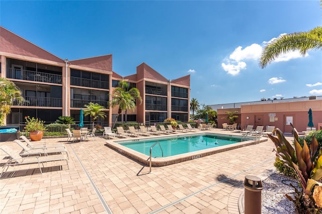 3160 Matecumbe Key Rd Unit 238, Punta Gorda, FL 33955 - community pool featuring a patio area