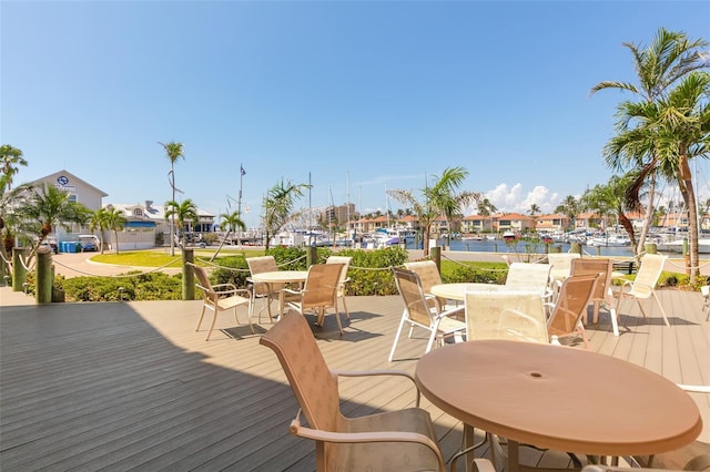 3160 Matecumbe Key Rd Unit 238, Punta Gorda, FL 33955 - deck featuring outdoor dining area