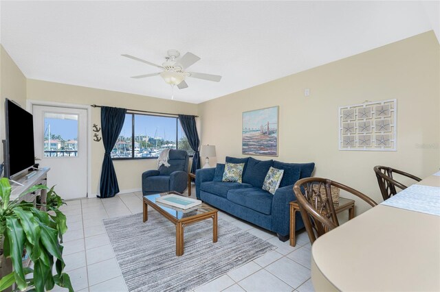3160 Matecumbe Key Rd Unit 238, Punta Gorda, FL 33955 - living area with light tile patterned flooring and ceiling fan