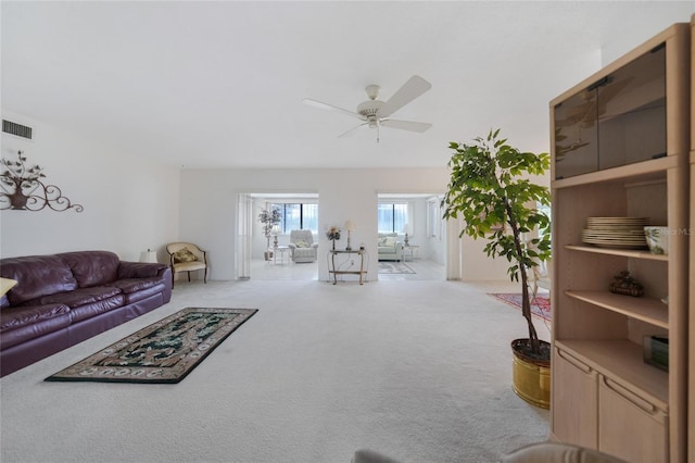 2193 Beacon Dr, Port Charlotte, FL 33952 - carpeted living room with ceiling fan