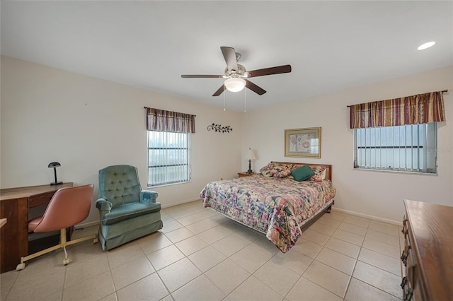 2193 Beacon Dr, Port Charlotte, FL 33952 - bedroom with baseboards, a ceiling fan, and light tile patterned floors