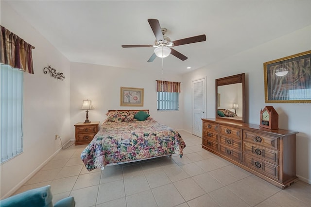 2193 Beacon Dr, Port Charlotte, FL 33952 - bedroom featuring light tile patterned floors, a closet, a ceiling fan, recessed lighting, and baseboards