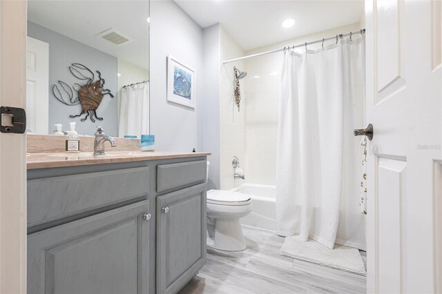 3329 Sunset Key Cir Unit 107, Punta Gorda, FL 33955 - full bath with toilet, vanity, and shower / bathtub combination with curtain