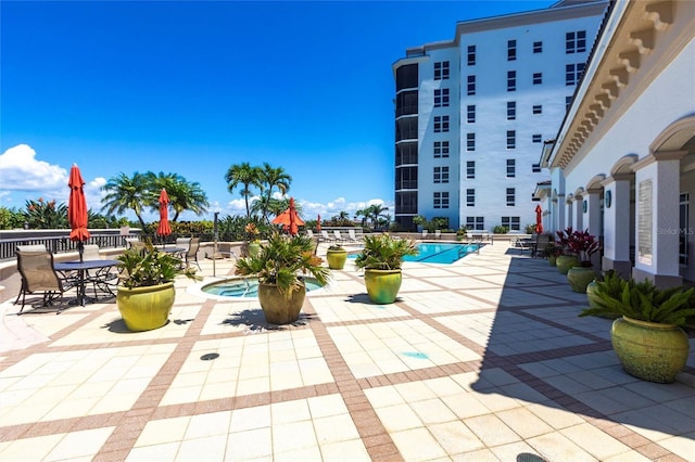 3329 Sunset Key Cir Unit 107, Punta Gorda, FL 33955 - community pool featuring a patio