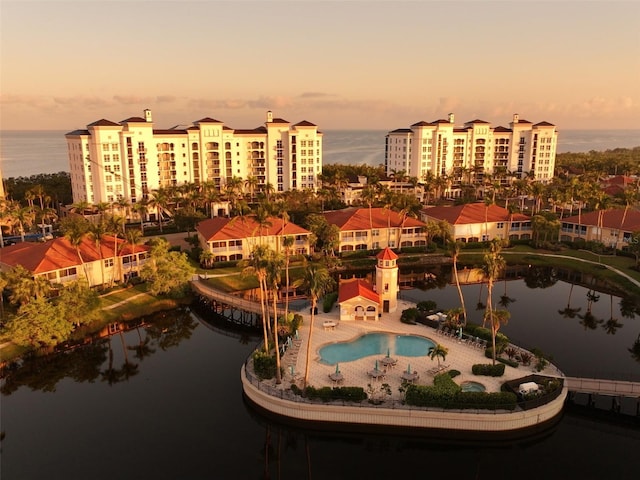 3329 Sunset Key Cir Unit 107, Punta Gorda, FL 33955 - aerial view at dusk of a water view and view of pool