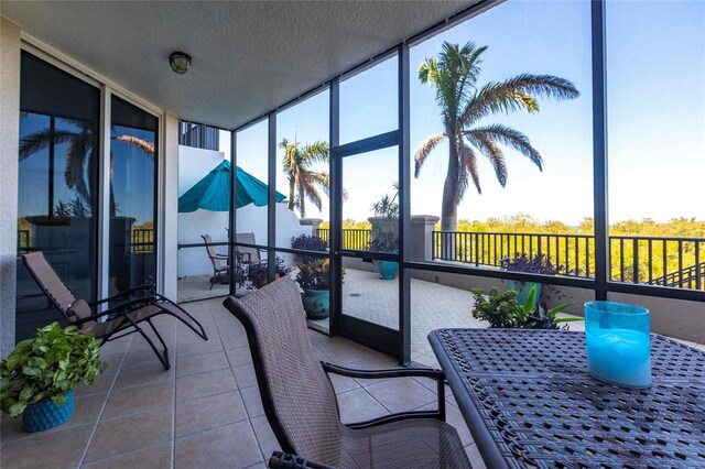 3329 Sunset Key Cir Unit 107, Punta Gorda, FL 33955 - sunroom / solarium with plenty of natural light