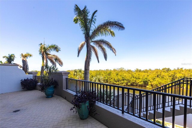 3329 Sunset Key Cir Unit 107, Punta Gorda, FL 33955 - view of patio with a balcony