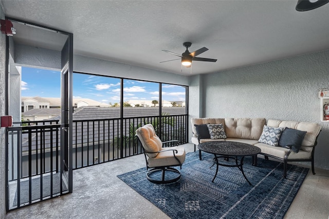 14267 Heritage Landing Blvd Unit 1223, Punta Gorda, FL 33955 - living room featuring a textured wall, a ceiling fan, and a textured ceiling