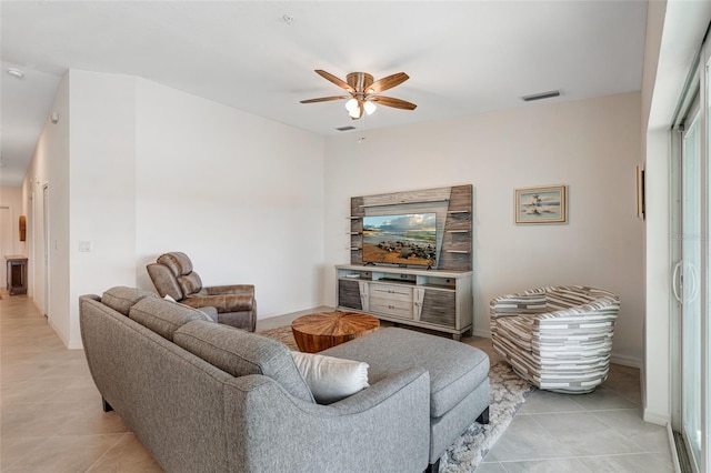 14267 Heritage Landing Blvd Unit 1223, Punta Gorda, FL 33955 - living area with a ceiling fan, light tile patterned floors, and baseboards