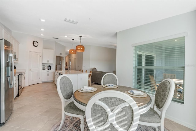 14267 Heritage Landing Blvd Unit 1223, Punta Gorda, FL 33955 - dining space with light tile patterned floors and recessed lighting