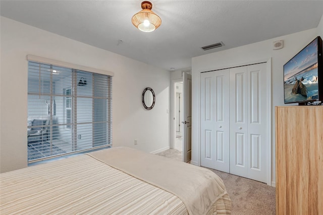 14267 Heritage Landing Blvd Unit 1223, Punta Gorda, FL 33955 - carpeted bedroom with a closet